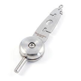 Kuchelmeister Multiloop fly tying tool in matte stainless steel with a circular balance weight and attachment hook.