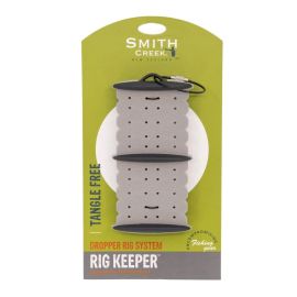 Smith Creek Rig Keeper Vorfachhalter mit Befestigungskabel neben Originalverpackung