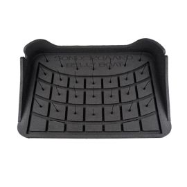 Top view of a black Søndergaard Belly Boat stripping basket made of foam, featuring flexible silicone posts for line management.